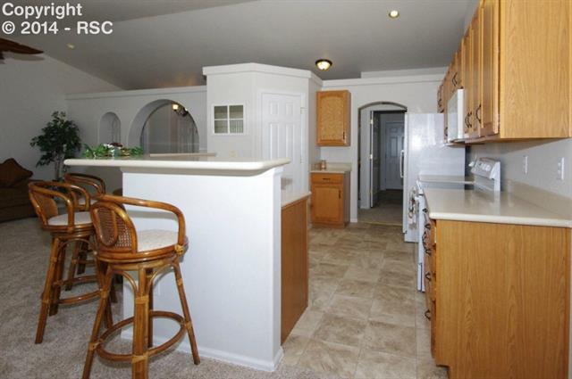 11902 Rio Secco Road Peyton, CO 80831 - Photo 8 of 23 Kitchen & Eating Bar