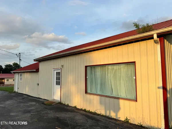 a back view of a house with a outdoor space