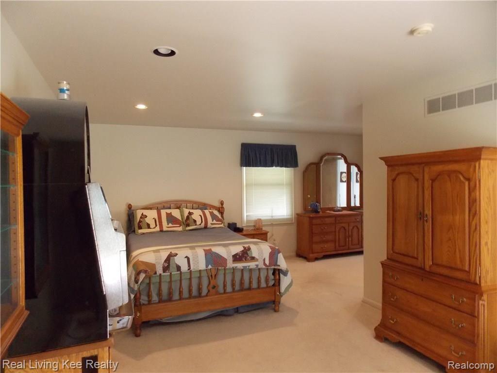 1970 Moffat Road Leonard, MI 48367 - Photo 25 of 45 Master Suite