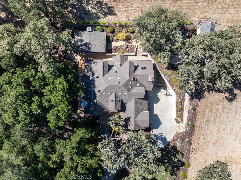 6360 Navarette Avenue Atascadero, CA 93422 - Photo 2 of 75 Set on 1.6 acres adorned with majestic oaks, this home offers natural beauty and privacy.