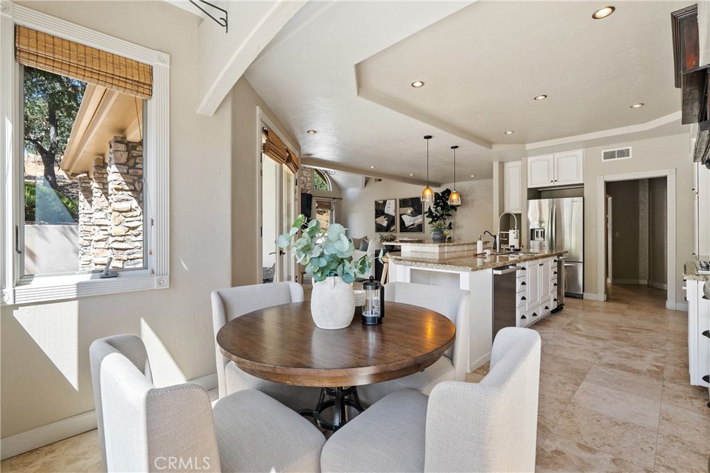 6360 Navarette Avenue Atascadero, CA 93422 - Photo 21 of 75 a kitchen with a table and chairs