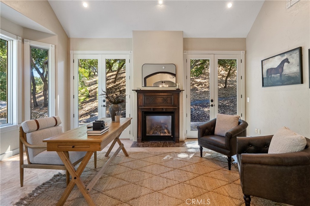6360 Navarette Avenue Atascadero, CA 93422 - Photo 26 of 75 a living room with furniture and a fireplace