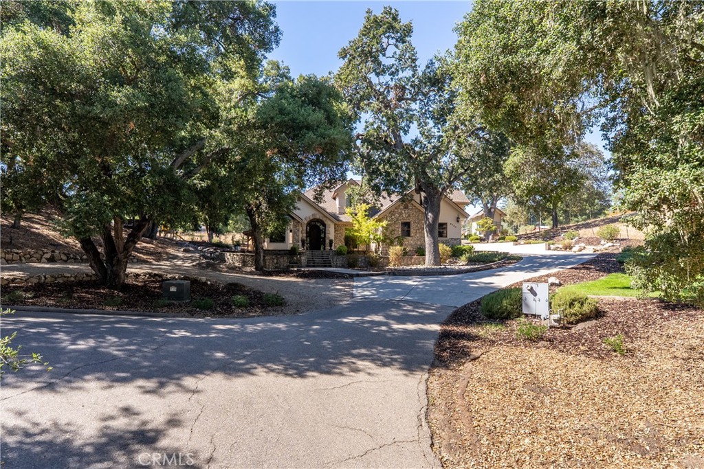 6360 Navarette Avenue Atascadero, CA 93422 - Photo 3 of 75 The driveway gently leads you to the front of the home.