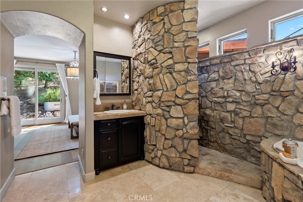 6360 Navarette Avenue Atascadero, CA 93422 - Photo 35 of 75 a bathroom with a sink and a mirror