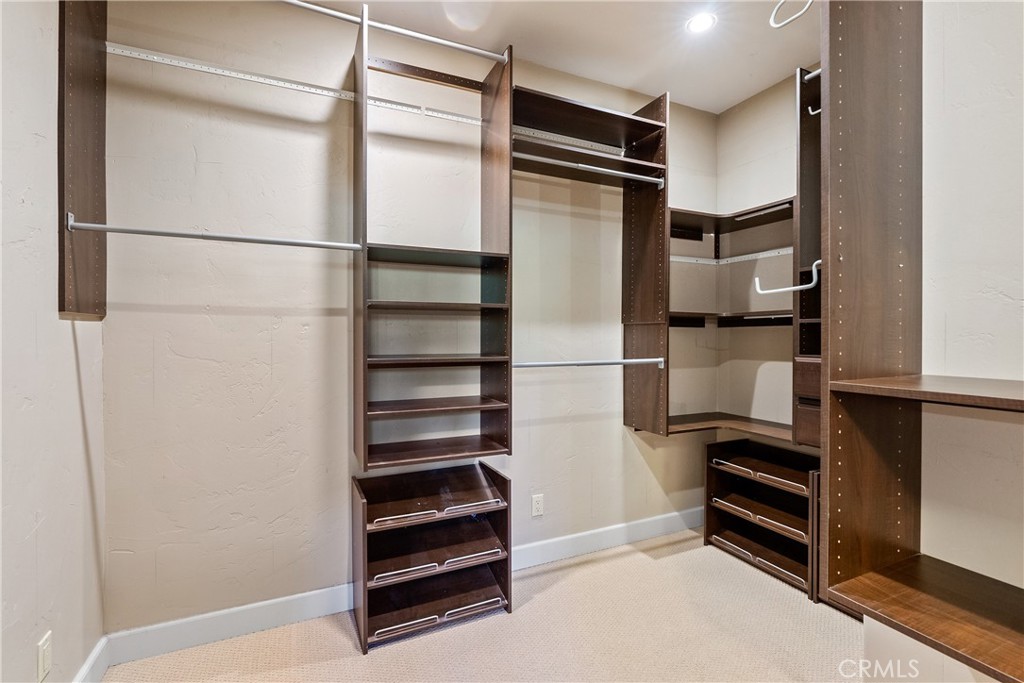 6360 Navarette Avenue Atascadero, CA 93422 - Photo 38 of 75 a view of walk in closet with empty racks