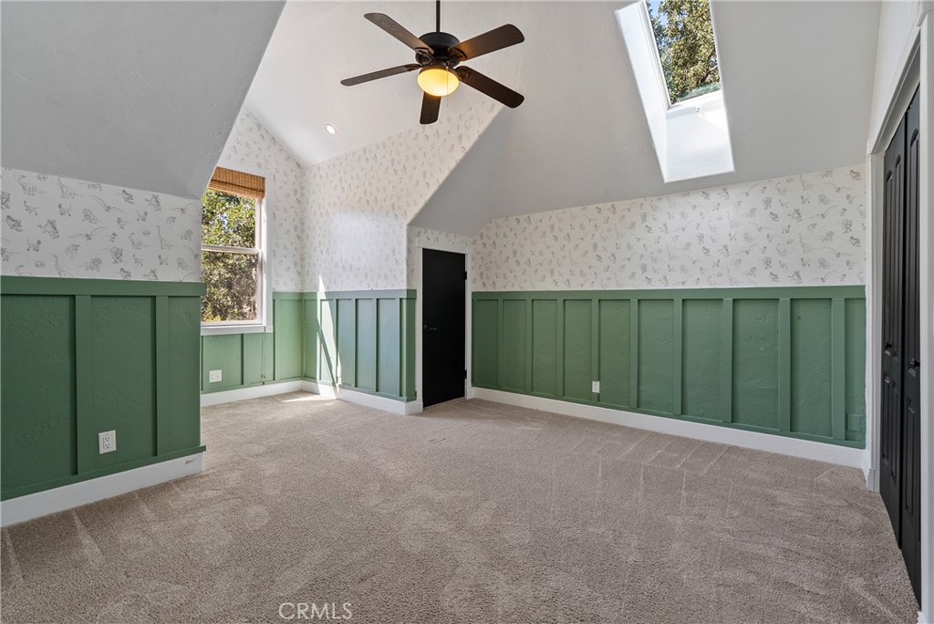 6360 Navarette Avenue Atascadero, CA 93422 - Photo 43 of 75 a view of a livingroom with a ceiling fan and window