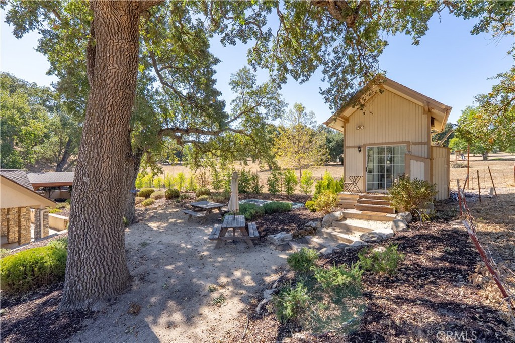 6360 Navarette Avenue Atascadero, CA 93422 - Photo 56 of 75 a view of a house with a tree in the yard
