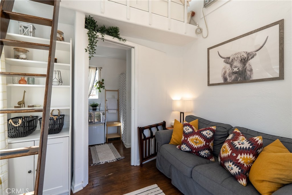 6360 Navarette Avenue Atascadero, CA 93422 - Photo 58 of 75 a living room with furniture and a flat screen tv