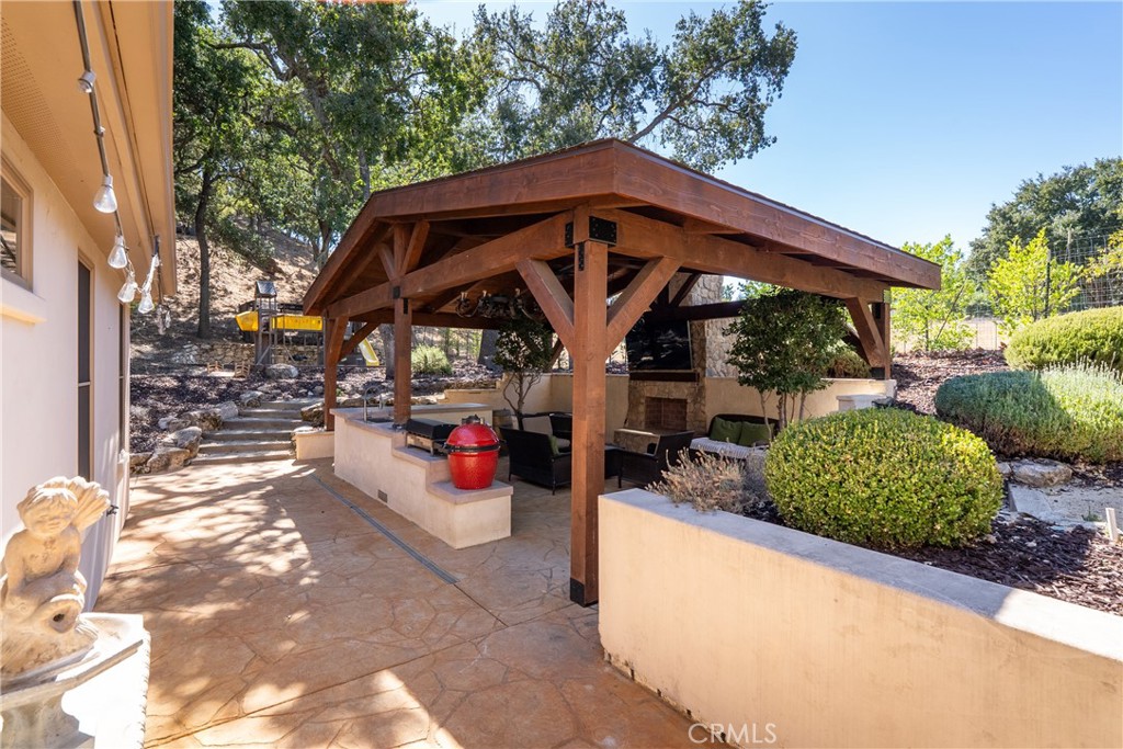 6360 Navarette Avenue Atascadero, CA 93422 - Photo 67 of 75 Behind the home we find a huge covered patio.