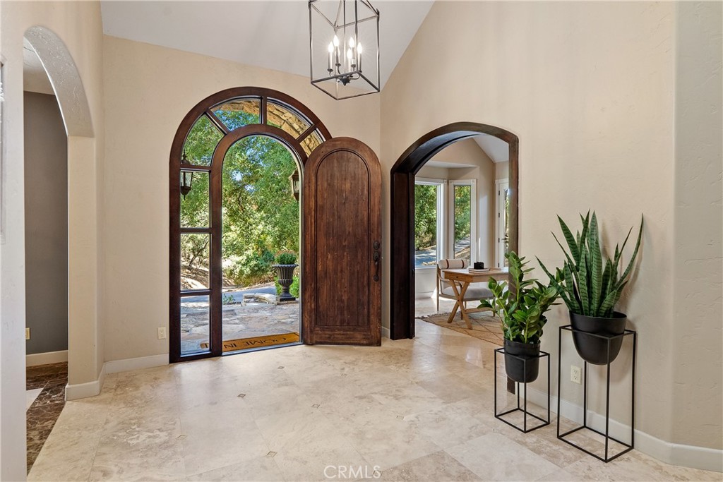 6360 Navarette Avenue Atascadero, CA 93422 - Photo 7 of 75 Stepping inside you are greeted by travertine tile floors that flow through most of the first level.