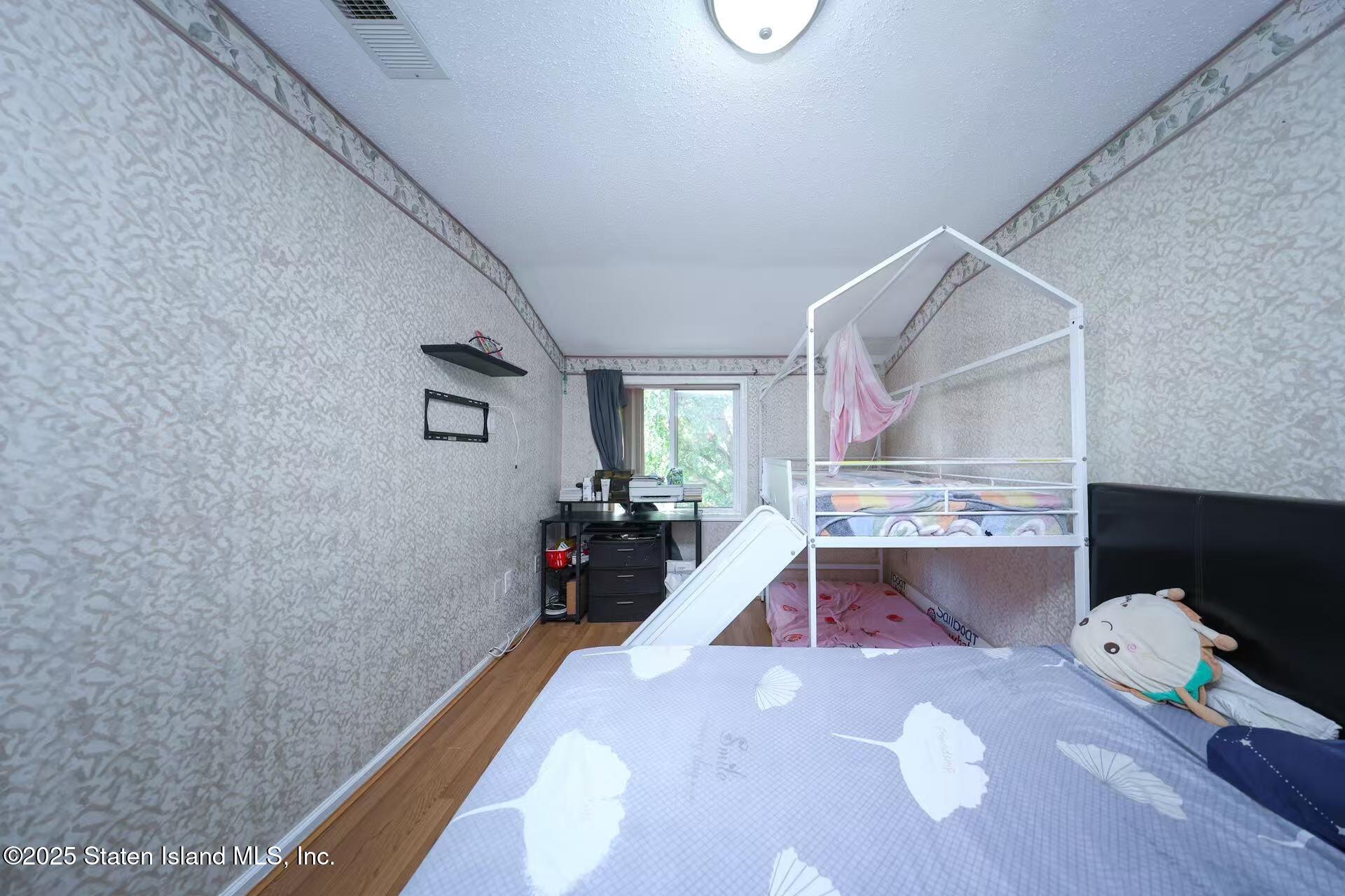 78 Emily Lane Staten Island, NY 10312 - Photo 17 of 24 a view of livingroom with furniture and workspace
