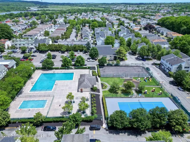an aerial view of a house with a garden