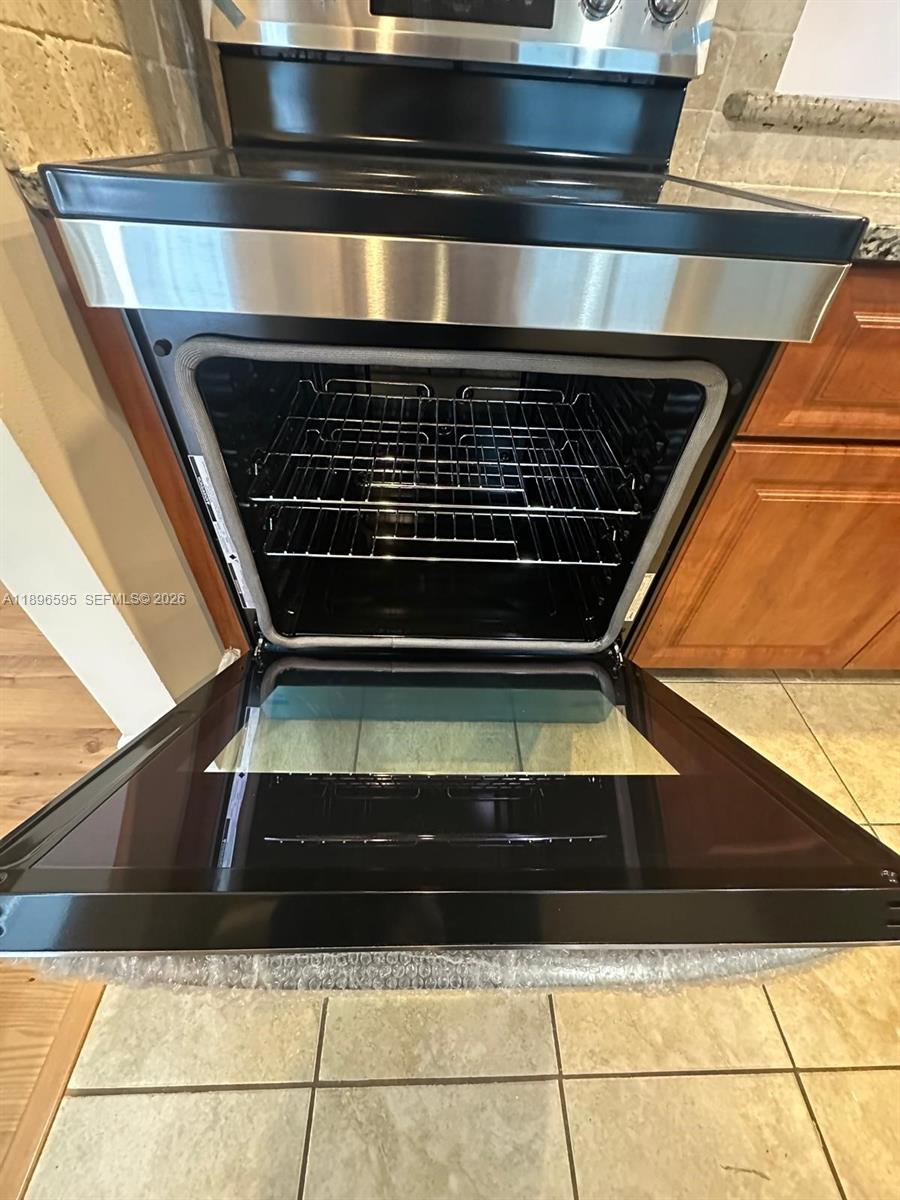 9848 Marina Boulevard, Unit 811 Boca Raton, FL 33428 - Photo 13 of 86 Brand new Electric range
