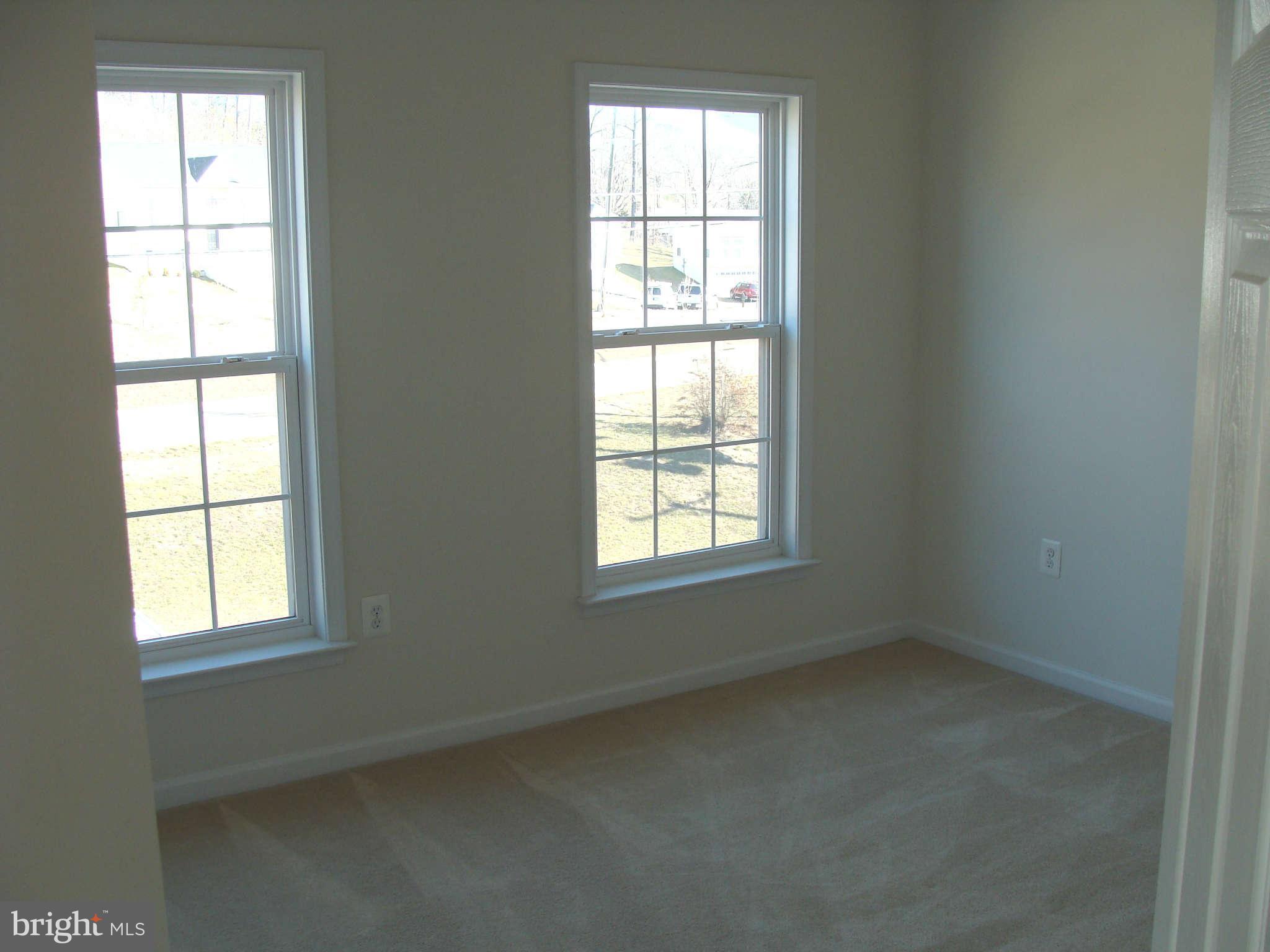 17686 Possum Point Road Dumfries, VA 22026 - Photo 10 of 23 an empty room with a window