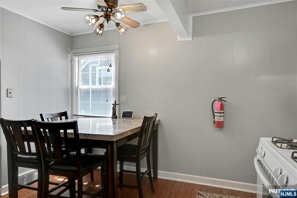 85 Edison Street Clifton, NJ 07013 - Photo 8 of 28 a view of a dining room with furniture and wooden floor