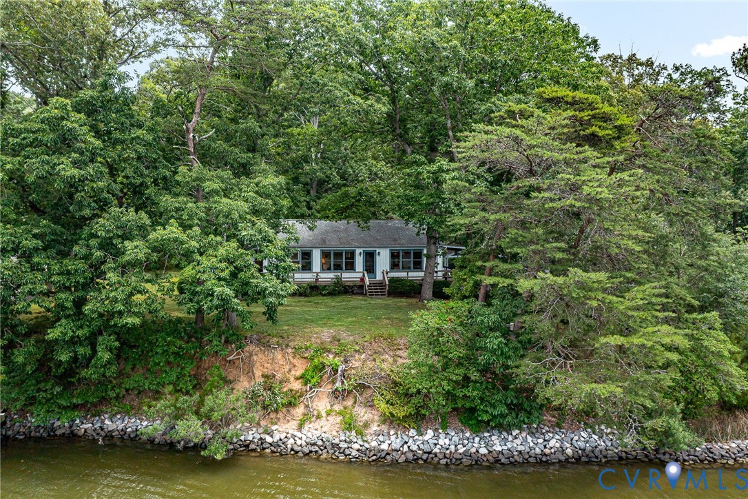 142 Bridge Lane Reedville, VA 22539 - Photo 34 of 56 a view of a house with a yard