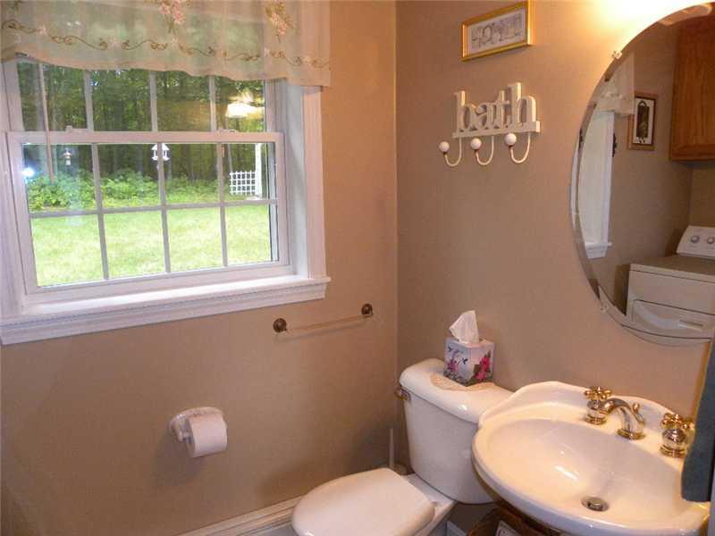 40 Sawyer Road Poland, ME 04274 - Photo 12 of 28 1ST FLOOR HALF BATH IN ENTRY FROM GARAGE