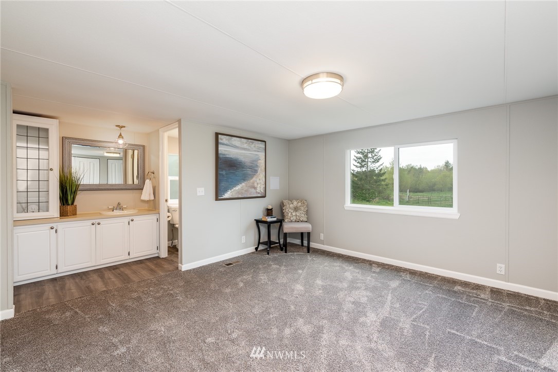 7992 Ham Road Custer, WA 98240 - Photo 13 of 31 a living room with furniture and a window
