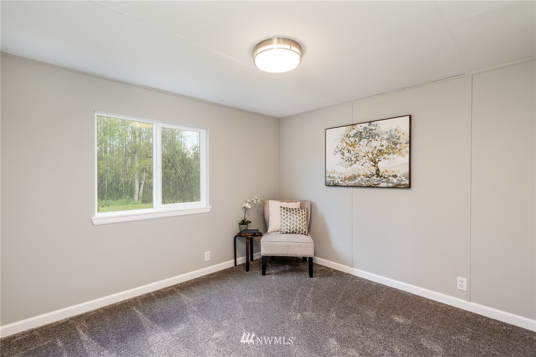 7992 Ham Road Custer, WA 98240 - Photo 16 of 31 a living room with furniture and a window
