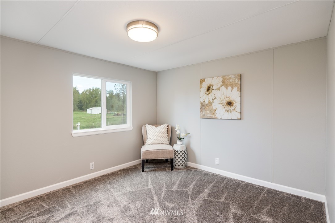 7992 Ham Road Custer, WA 98240 - Photo 17 of 31 a living room with furniture and a window