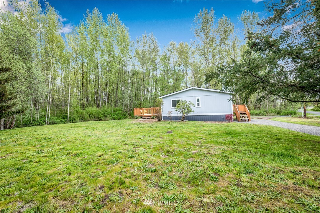 7992 Ham Road Custer, WA 98240 - Photo 20 of 31 a view of a tiny house with a yard