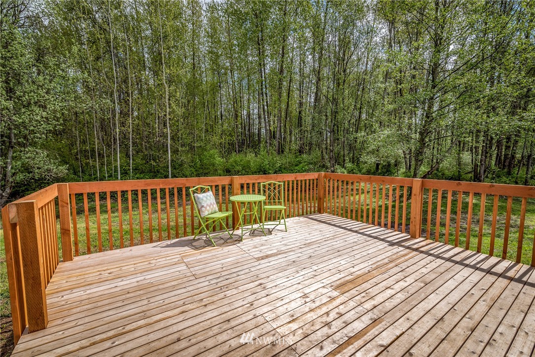 7992 Ham Road Custer, WA 98240 - Photo 24 of 31 a view of balcony with wooden floor and fence