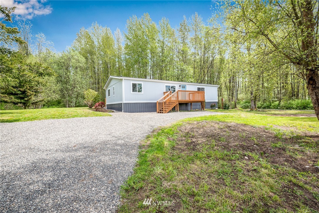 7992 Ham Road Custer, WA 98240 - Photo 26 of 31 a view of a house with a yard and a large tree
