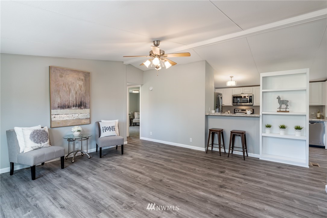 7992 Ham Road Custer, WA 98240 - Photo 5 of 31 a living room with furniture and a dining table with wooden floor