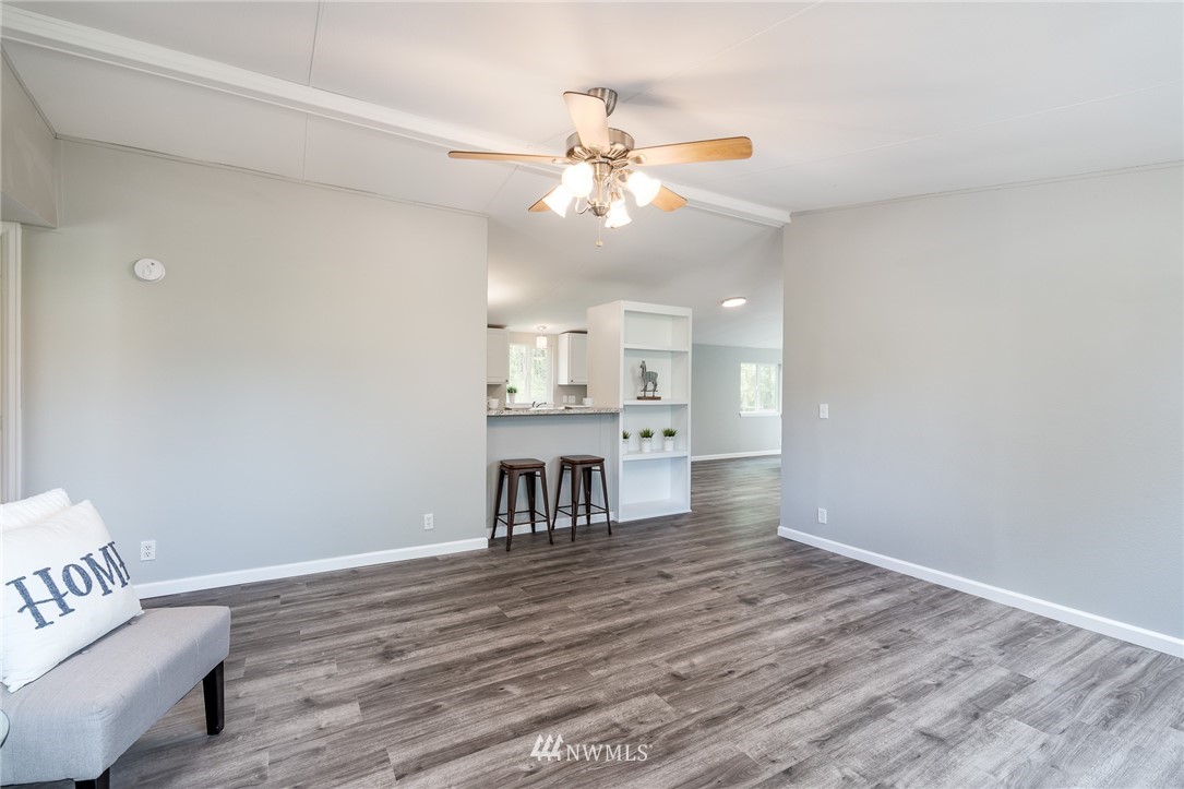 7992 Ham Road Custer, WA 98240 - Photo 6 of 31 a view of kitchen and dining room with wooden floor
