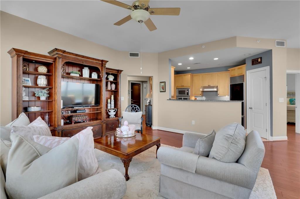 2828 Peachtree Road Northwest, Unit 1901 Atlanta, GA 30305 - Photo 5 of 35 a living room with furniture kitchen view and a window