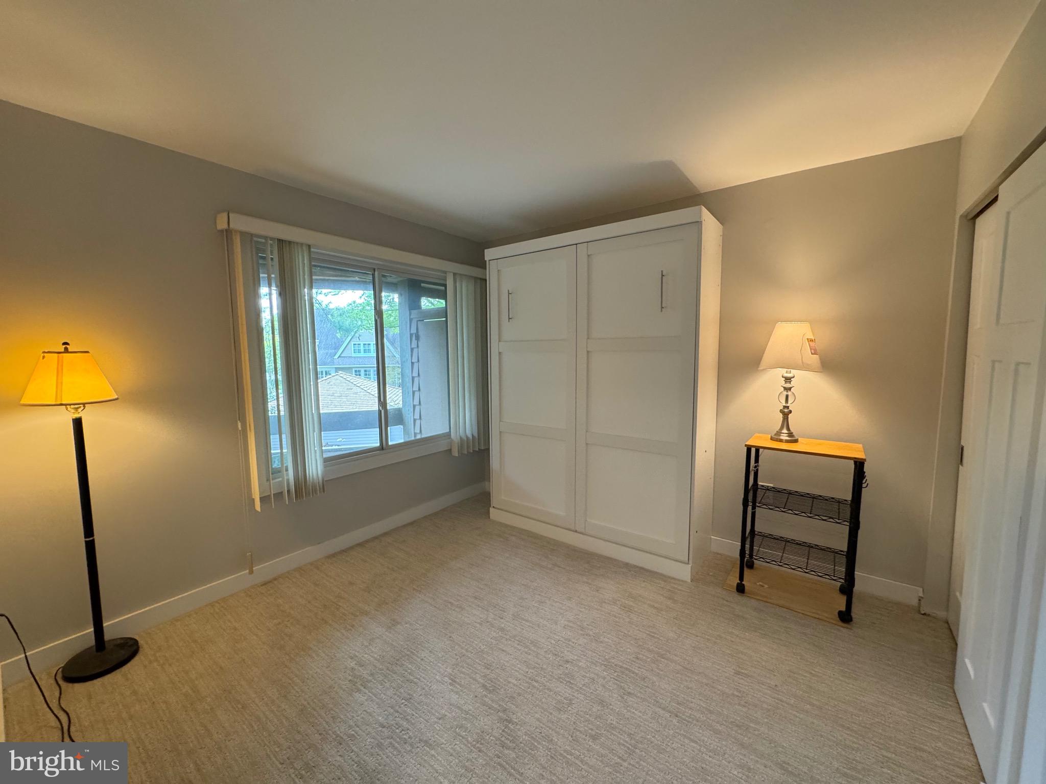 1 President Point Drive, Unit B2 Annapolis, MD 21403 - Photo 14 of 36 a view of an empty room with a window