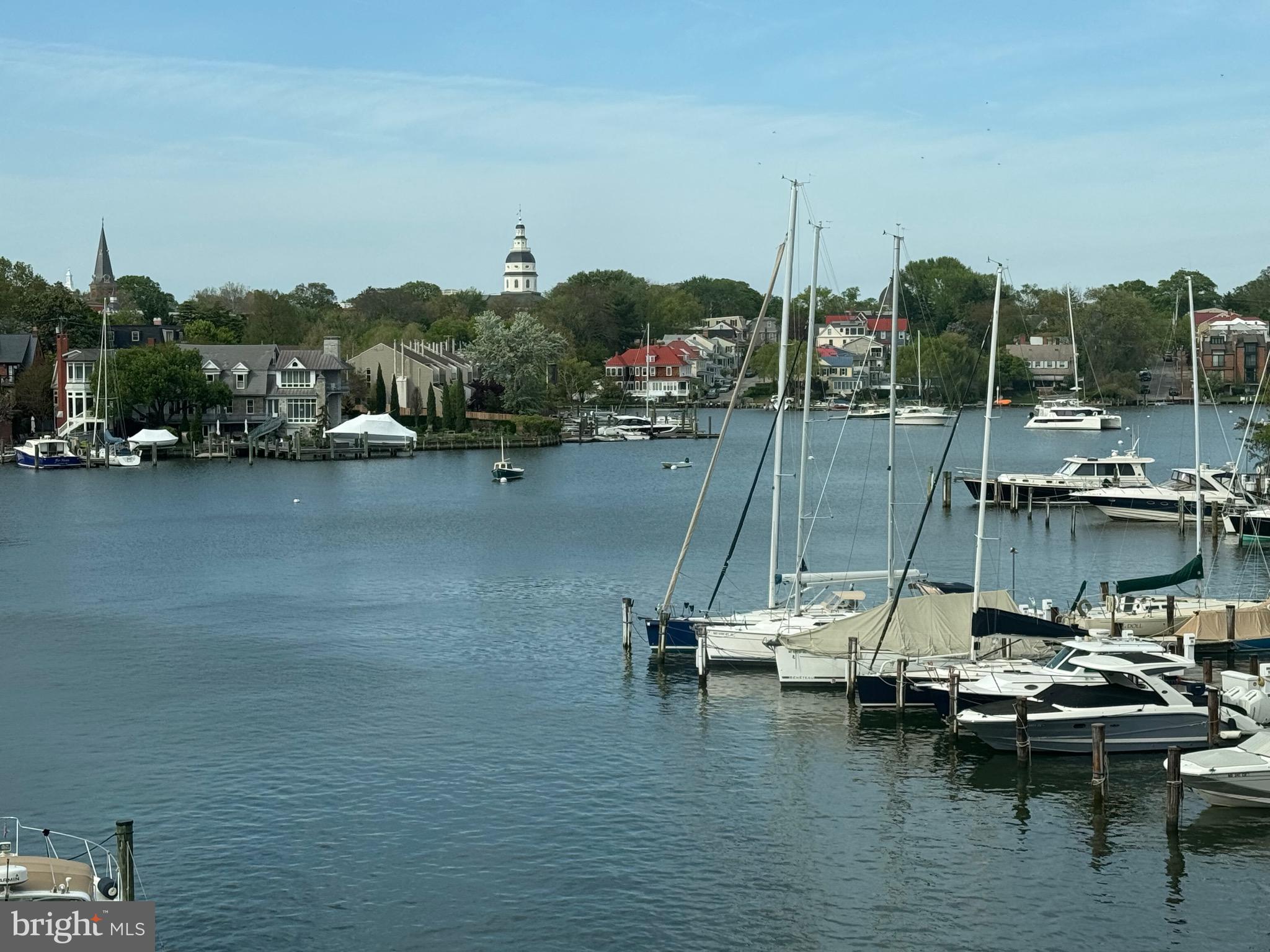 1 President Point Drive, Unit B2 Annapolis, MD 21403 - Photo 25 of 36 a view of a lake with boats and trees