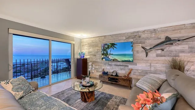 a front view of a house with outdoor seating