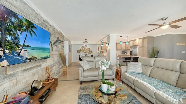 a view of a dining room with furniture wooden floor and chandelier