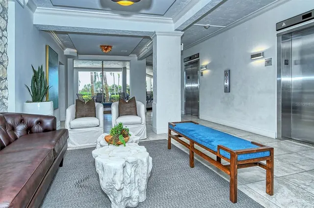 a backyard of a house with barbeque oven table and chairs