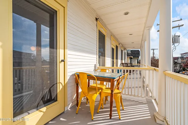 a living room with furniture fireplace and window