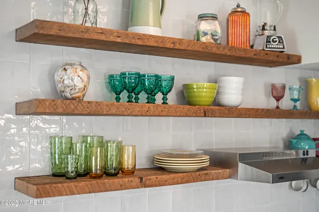a bathroom with a sink a mirror and a bathtub