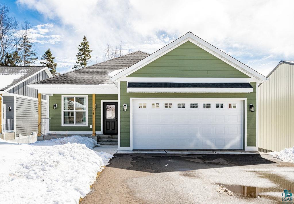 2236 Hoover Street Duluth, MN 55811 - Photo 1 of 52 View of front of house with a garage and driveway