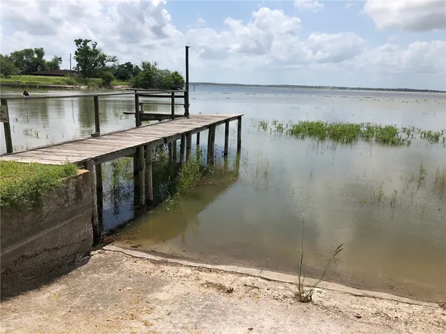 a view of a balcony with an ocean