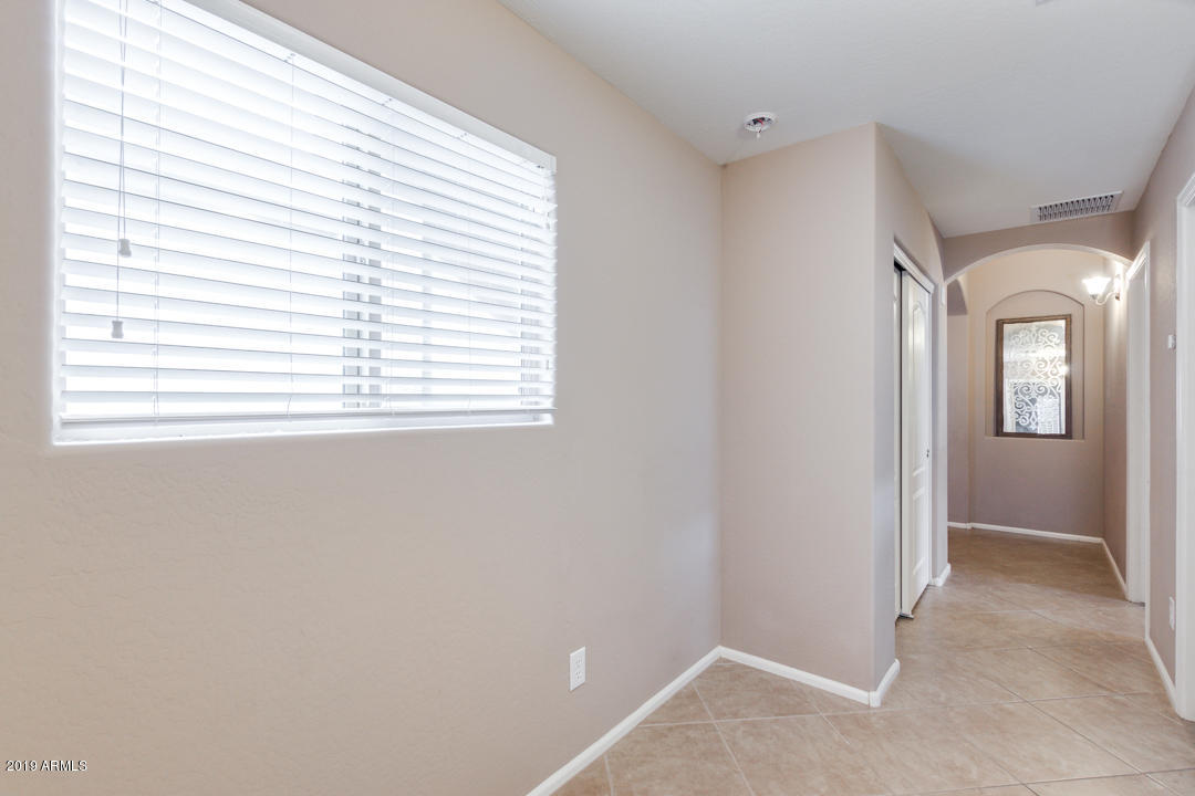 17776 West Charter Oak Road Surprise, AZ 85388 - Photo 22 of 35 a view of a room that has a window in it