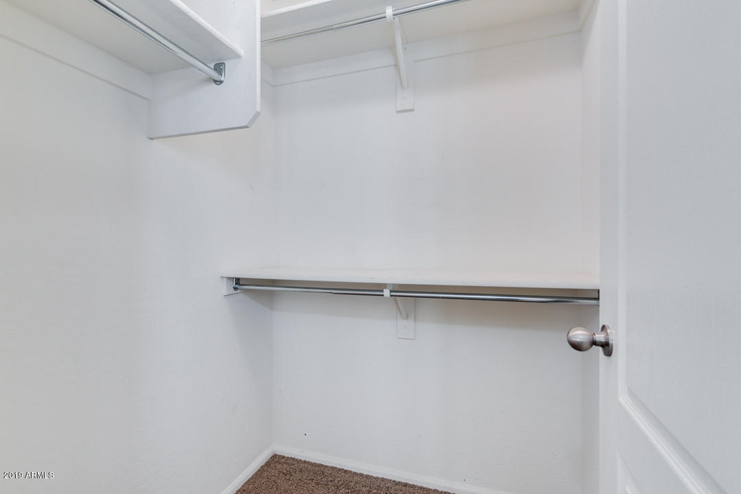 17776 West Charter Oak Road Surprise, AZ 85388 - Photo 27 of 35 a view of a room with racks on the wall