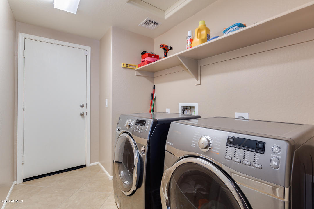 17776 West Charter Oak Road Surprise, AZ 85388 - Photo 28 of 35 a utility room with dryer and washer