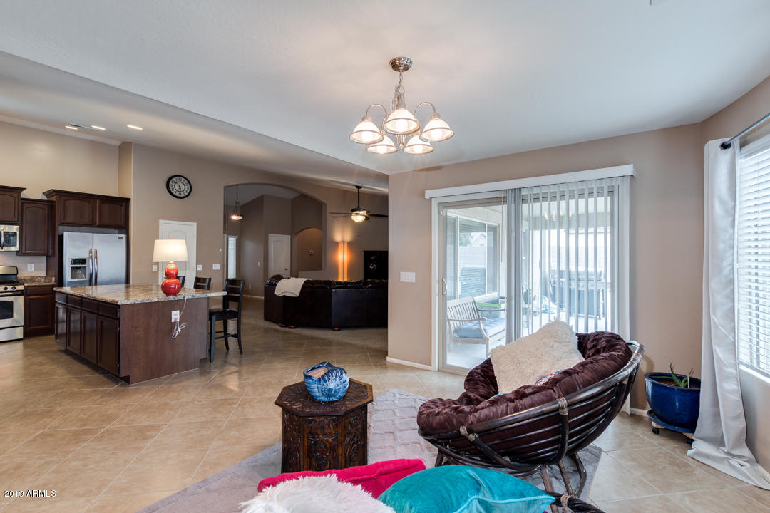 17776 West Charter Oak Road Surprise, AZ 85388 - Photo 31 of 35 a living room with furniture and a window