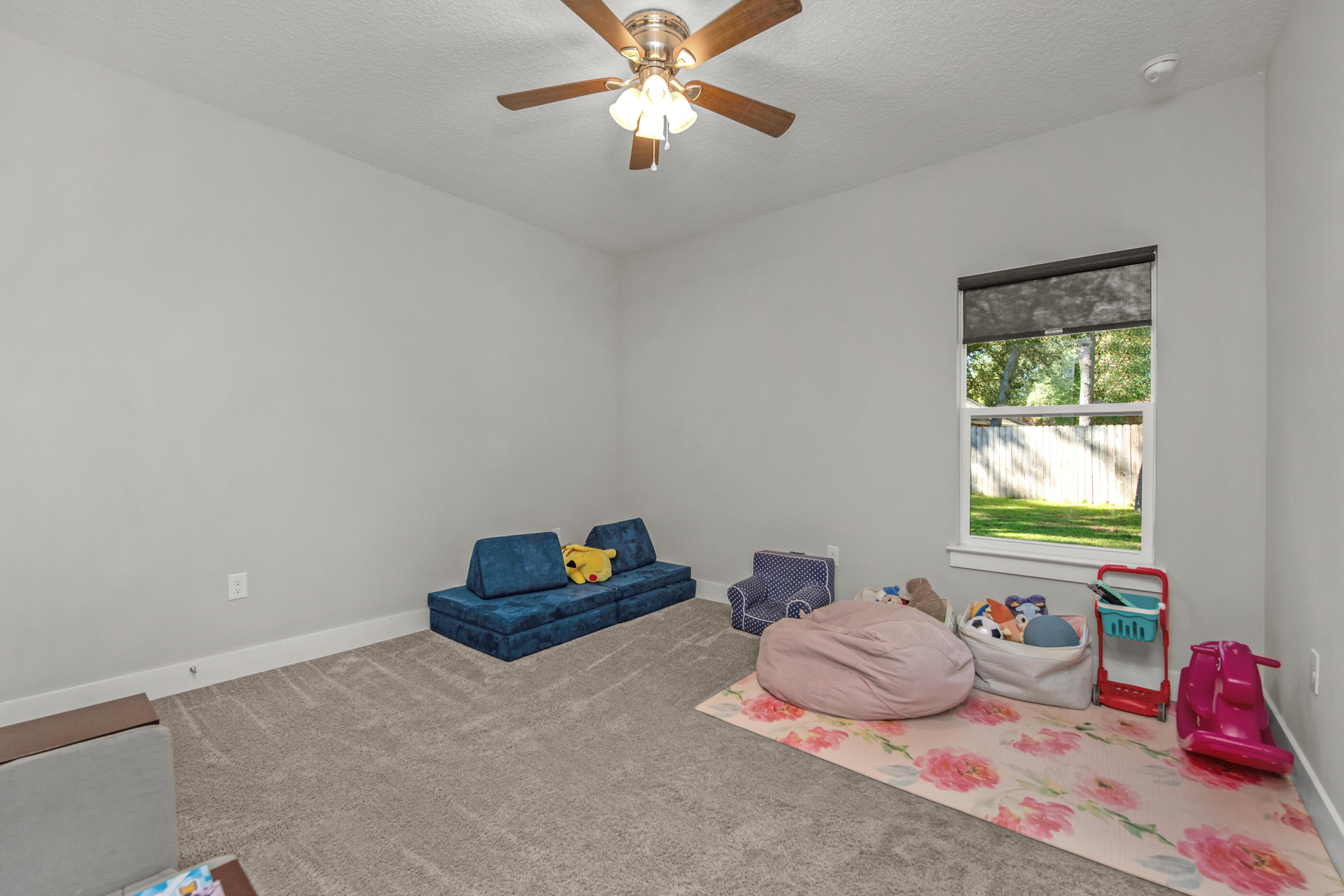 2800 Ram Lane Crestview, FL 32539 - Photo 16 of 24 a bedroom with a bed and a window