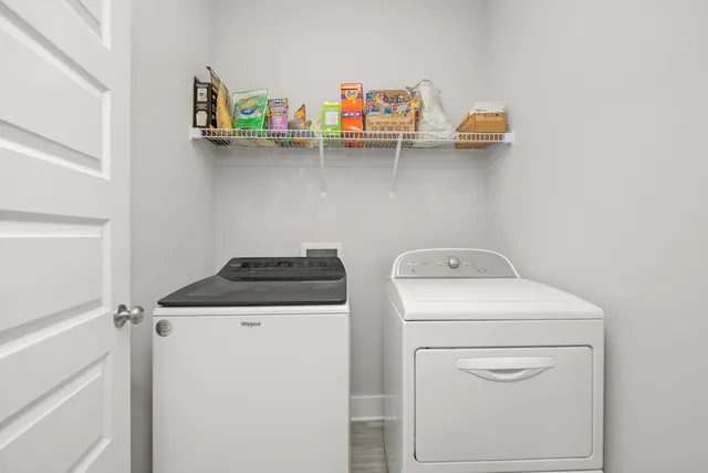 a utility room with dryer and washer