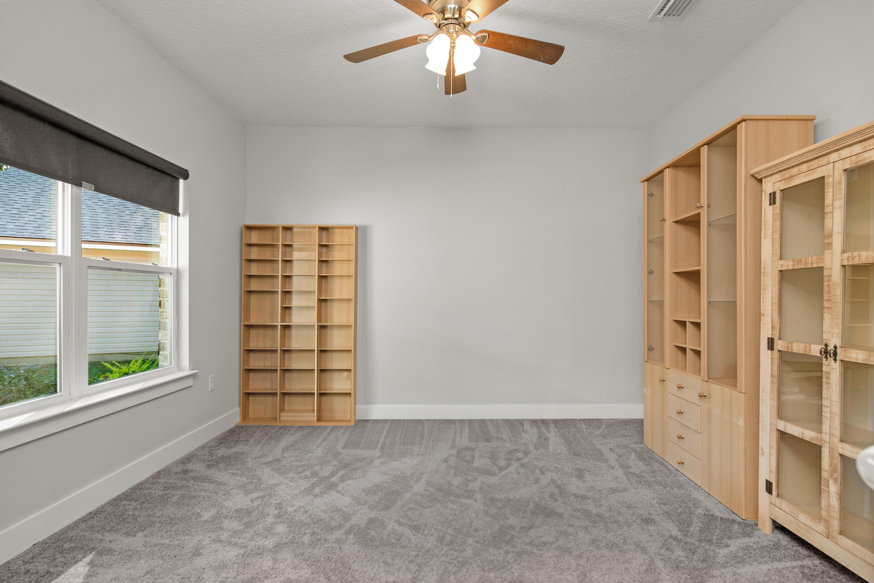 2800 Ram Lane Crestview, FL 32539 - Photo 5 of 24 an empty room with windows and closet