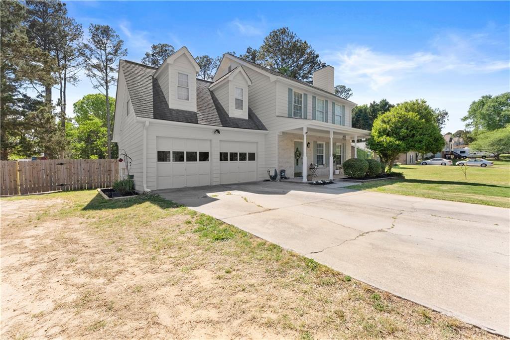 709 Muirfield Drive Winder, GA 30680 - Photo 11 of 65 front view of a house with a yard