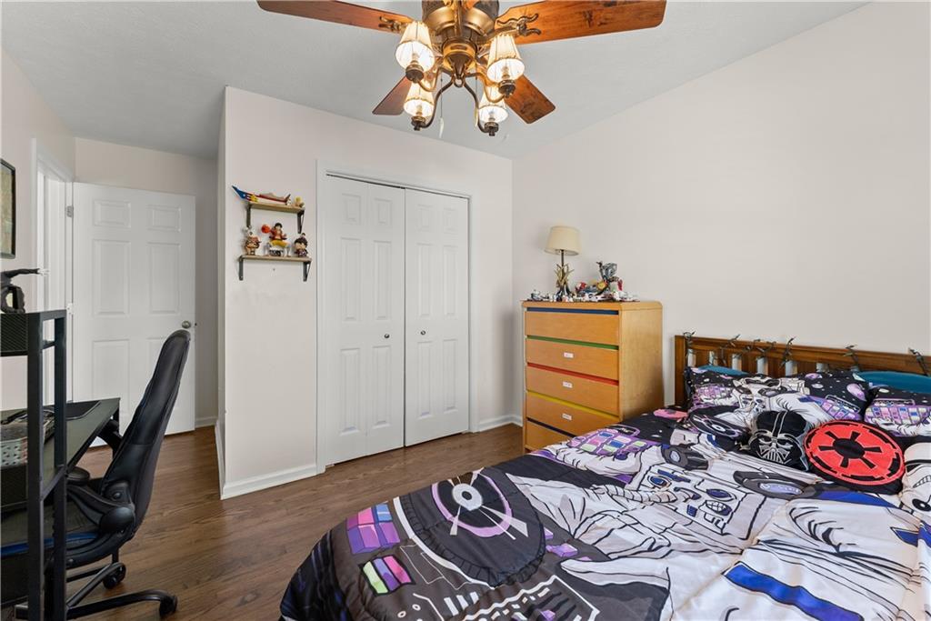 709 Muirfield Drive Winder, GA 30680 - Photo 35 of 65 a bedroom with bed and a window