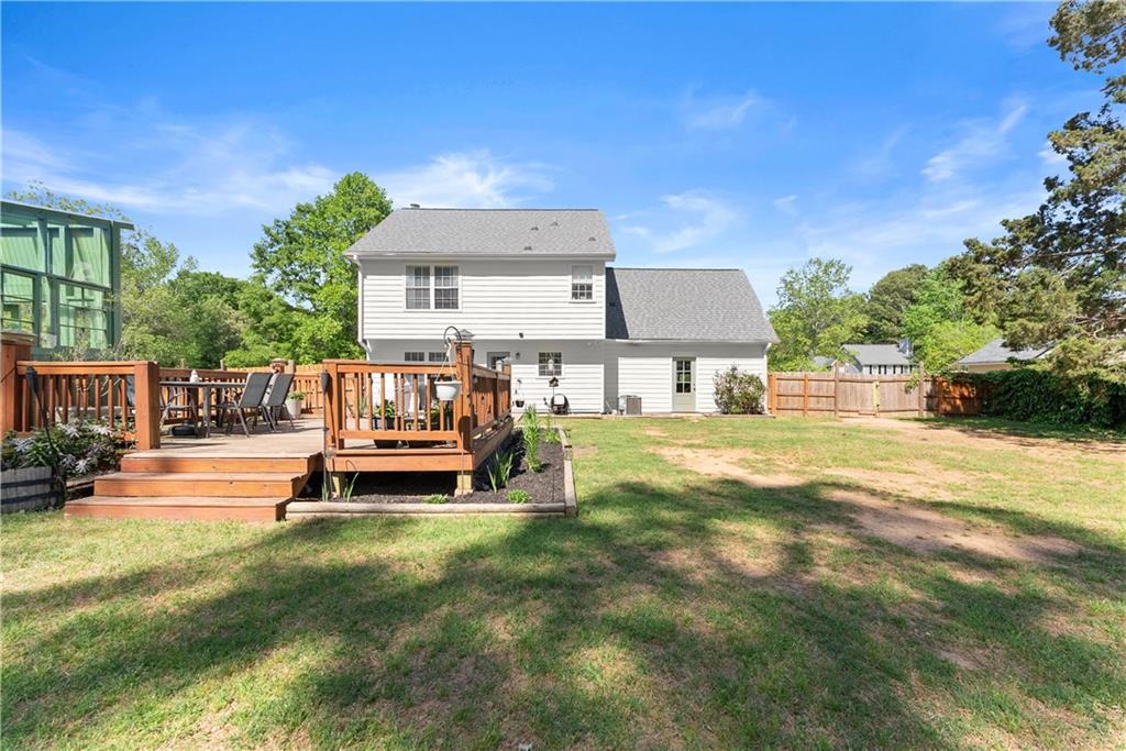 709 Muirfield Drive Winder, GA 30680 - Photo 47 of 65 a view of a house with a back yard