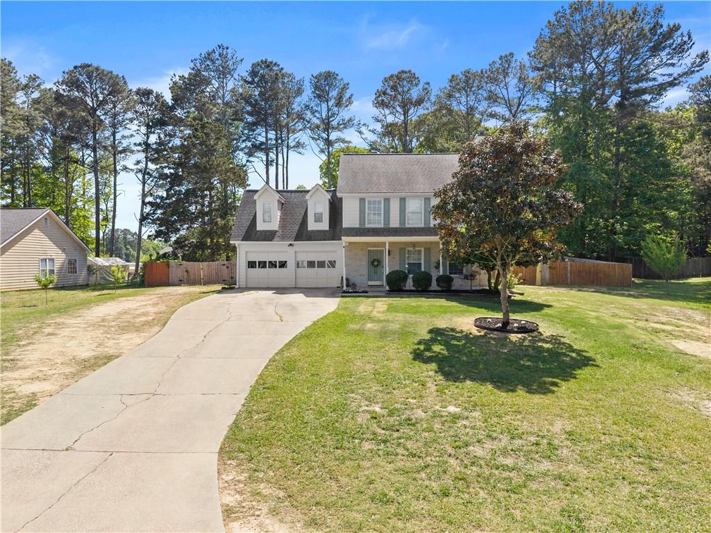 709 Muirfield Drive Winder, GA 30680 - Photo 9 of 65 a view of swimming pool with a yard and trees
